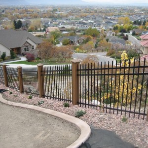 Trex Fence posts with ornamental iron panels